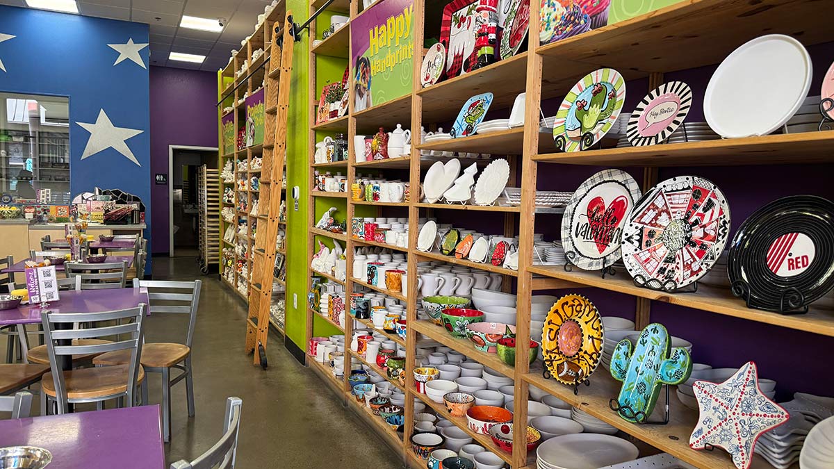 Pottery pieces on shelves at As You Wish Pottery