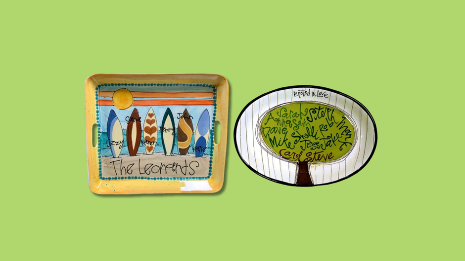 Decorative tray with surfboard design and a smaller inset of a tree with text on a green background