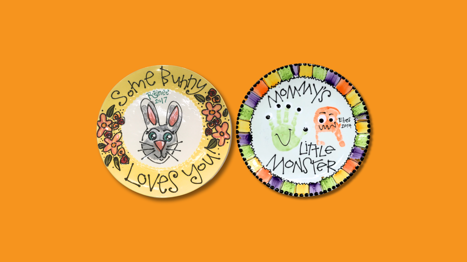 Two decorative plates with cartoon characters on an orange background