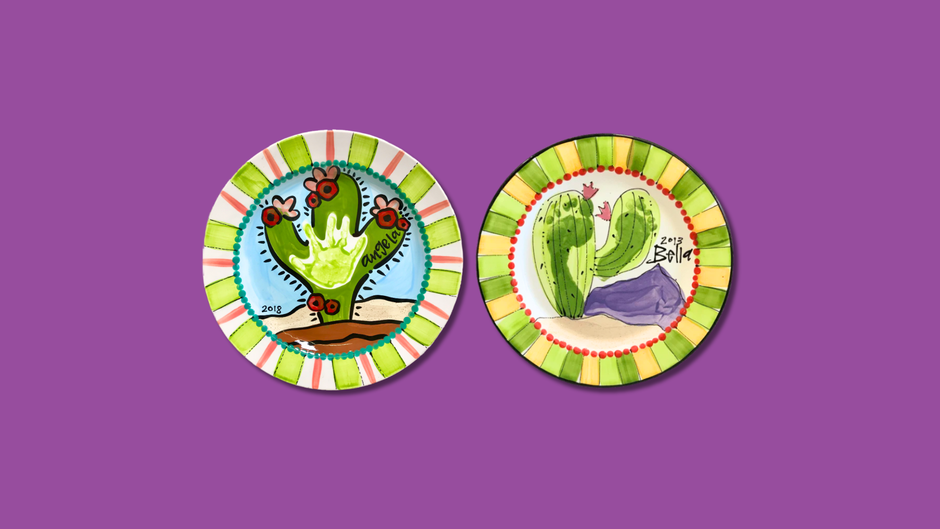 Two colorful plates with cactus designs on a purple background